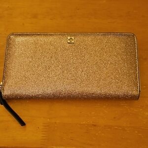 Kate Spade Mavis Street Neda continental zip wallet in Gold glitter vinyl